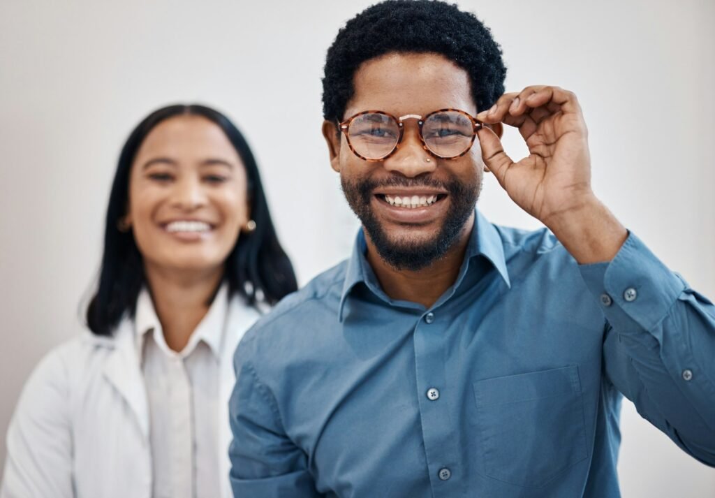 Optometry, glasses and portrait of black man and doctor for retail, choice and vision. Shopping, he